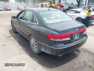 2008 Hyundai Azera GLS with VIN KMHFC46D48A335587, listed as a IAAI auction lot 42092272 with 174,537 mi miles and . Bid and sale history available at DreamBid. Image 3.