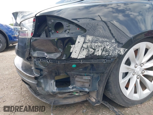 2017 Tesla Model S 60 with VIN 5YJSA1E19HF226094, listed as a IAAI auction lot 40931307 with 80,392 mi miles and . Bid and sale history available at DreamBid. Image 23.