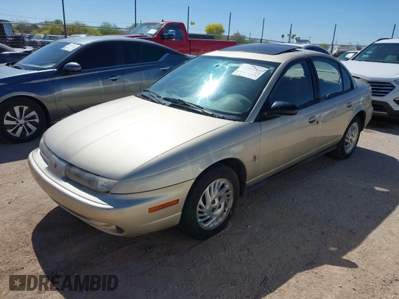 1998 Saturn SL z VIN 1G8ZK5271WZ129808, wystawiony jako IAAI lot #41993909 z przebiegiem 172 551 mil mil oraz . Historia ofert i sprzedaży dostępna na DreamBid. Obrazek 2.