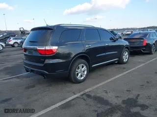 2013 Dodge Durango Crew with VIN 1C4SDJDT9DC538949, listed as a IAAI auction lot 41366816 with 75,675 mi miles. Bid and sale history available at carsss.com. Image 4.
