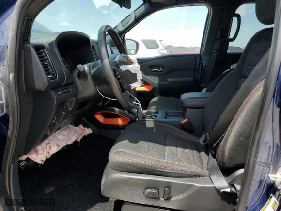 2023 Nissan Frontier PRO-4X with VIN 1N6ED1EK8PN672862, listed as a Copart auction lot 52718105 with 17,855 mi miles and Salvage Title. Bid and sale history available at carsss.com. Image 7.