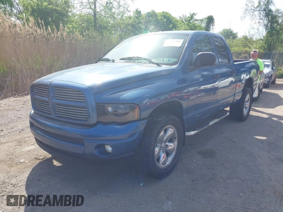 2003 Dodge 1500 ST with VIN 1D7HU18N13S229881, listed as a IAAI auction lot 42169989 with 148,606 mi miles. Bid and sale history available at carsss.com. Image 2.