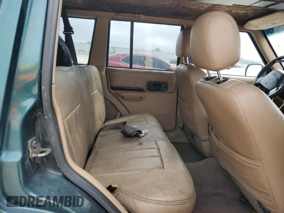 2001 Jeep Cherokee Sport with VIN 1J4FF58SX1L615967, listed as a Copart auction lot 43709235 with 241,326 mi miles and Clean title. Bid and sale history available at DreamBid. Image 11.