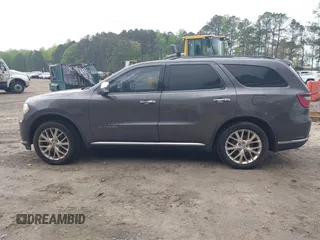 2014 Dodge Durango Citadel with VIN 1C4RDJEG1EC530474, listed as a IAAI auction lot 41961801 with 165,625 mi miles and . Bid and sale history available at DreamBid. Image 14.