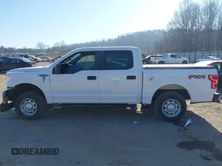 2019 Ford F-150 XL with VIN 1FTEW1EP8KKD98520, listed as a IAAI auction lot 41775566 with 128,021 mi miles. Bid and sale history available at carsss.com. Image 14.
