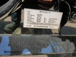 2024 Tesla Model Y z VIN 7SAYGDED2RA329802, wystawiony jako Copart lot #57748805 z przebiegiem 19 391 mil mil oraz Szkoda całkowita • Salvage title. Historia ofert i sprzedaży dostępna na DreamBid. Obrazek 14.