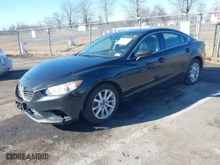 2015 Mazda Mazda6 i Sport with VIN JM1GJ1U60F1163055, listed as a IAAI auction lot 41587300 with 147,927 mi miles. Bid and sale history available at carsss.com. Image 2.
