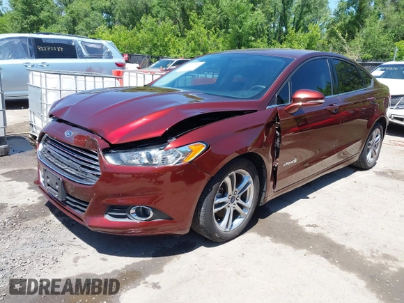 2016 Ford Fusion SE Hybrid with VIN 3FA6P0LU3GR143688, listed as a IAAI auction lot 42269789 with 163,910 mi miles and . Bid and sale history available at DreamBid. Image 2.