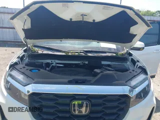 2023 Honda Passport EX-L z VIN 5FNYF8H57PB006499, wystawiony jako IAAI lot #42036371 z przebiegiem 51 404 mil mil oraz . Historia ofert i sprzedaży dostępna na DreamBid. Obrazek 10.