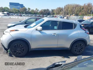 2015 Nissan Juke SV z VIN JN8AF5MR4FT511733, wystawiony jako IAAI lot #42298442 z przebiegiem 118 986 mil mil oraz . Historia ofert i sprzedaży dostępna na DreamBid. Obrazek 14.