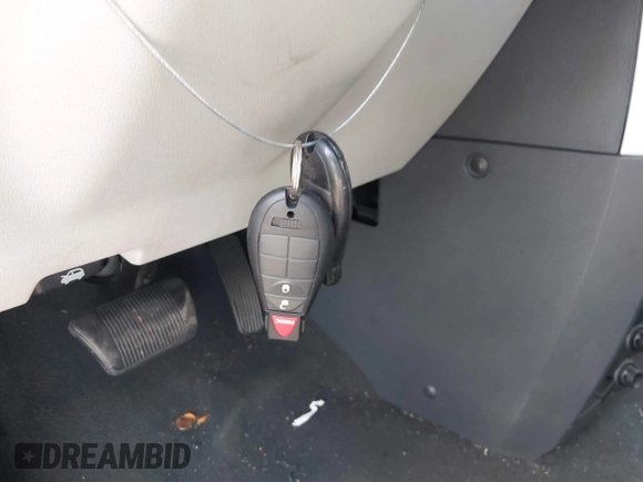 2010 Dodge Grand Caravan SE with VIN 2D4RN4DE2AR339889, listed as a IAAI auction lot 40034624 with 104,896 mi miles and . Bid and sale history available at DreamBid. Image 11.