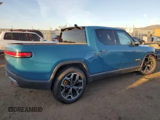 2022 Rivian R1T Launch Edition with VIN 7FCTGAAL5NN001219, listed as a Copart auction lot 86623924 with Not Provided miles and Salvage Title. Bid and sale history available at DreamBid. Image 3.