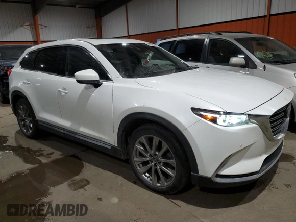 2019 Mazda CX-9 Signature with VIN JM3TCBEY6K0310047, listed as a Copart auction lot 84218354 with 130,758 mi miles and Clean title. Bid and sale history available at DreamBid. Image 4.