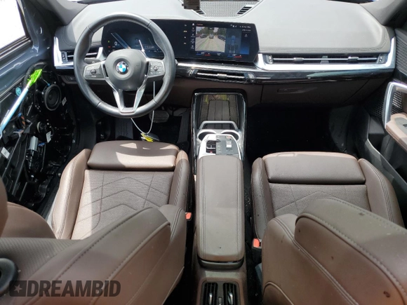 2023 BMW X1 xDrive28i with VIN WBX73EF08P5W51452, listed as a Copart auction lot 58420175 with 30,404 mi miles and Salvage title. Bid and sale history available at DreamBid. Image 8.