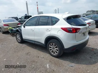 2016 Mazda CX-5 Sport with VIN JM3KE2BY6G0641051, listed as a IAAI auction lot 39959322 with 118,453 mi miles. Bid and sale history available at carsss.com. Image 3.
