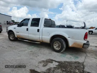 2002 Ford F-250 XL with VIN 1FTNW20F32EA27266, listed as a Copart auction lot 63110855 with 265,546 mi miles and Salvage title. Bid and sale history available at DreamBid. Image 2.