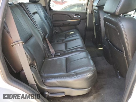 2007 GMC Yukon SLE z VIN 1GKFK13007J260249, wystawiony jako Copart lot #57646525 z przebiegiem 325 491 mil mil oraz Szkoda całkowita • Salvage title. Historia ofert i sprzedaży dostępna na DreamBid. Obrazek 11.