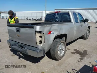 2009 Chevrolet Silverado 1500 LT with VIN 1GCEK29J29Z238478, listed as a IAAI auction lot 41838442 with 156,947 mi miles. Bid and sale history available at carsss.com. Image 4.
