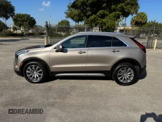 2023 Cadillac XT4 AWD Premium Luxury z VIN 1GYFZDR40PF108407, wystawiony jako Copart lot #86400754 z przebiegiem 8 724 mil mil oraz Nie do naprawy • Non repairable. Historia ofert i sprzedaży dostępna na DreamBid. Obrazek 12.