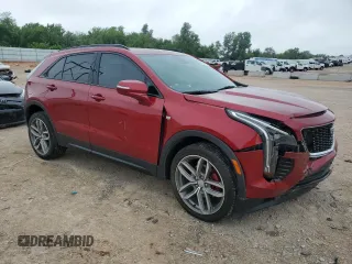 2021 Cadillac XT4 FWD Sport with VIN 1GYFZER49MF082391, listed as a Copart auction lot 56256804 with 24,415 mi miles and Salvage Title. Bid and sale history available at DreamBid. Image 4.