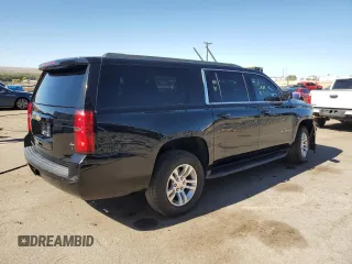 2019 Chevrolet Suburban LS with VIN 1GNSCGKC6KR180042, listed as a Copart auction lot 76829394 with 75,574 mi miles and Salvage title. Bid and sale history available at DreamBid. Image 3.