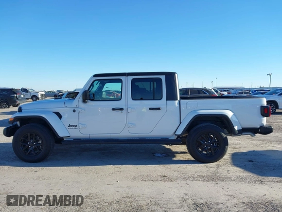 2023 Jeep Gladiator Willys z VIN 1C6HJTAGXPL528674, wystawiony jako IAAI lot #41376339 z przebiegiem 7 102 mil mil oraz . Historia ofert i sprzedaży dostępna na DreamBid. Obrazek 14.