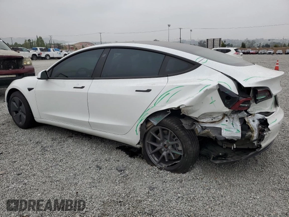 2021 Tesla Model 3 Standard Range Plus z VIN 5YJ3E1EAXMF065760, wystawiony jako Copart lot #54235345 z przebiegiem 54 413 mil mil oraz Szkoda całkowita • Salvage title. Historia ofert i sprzedaży dostępna na DreamBid. Obrazek 2.