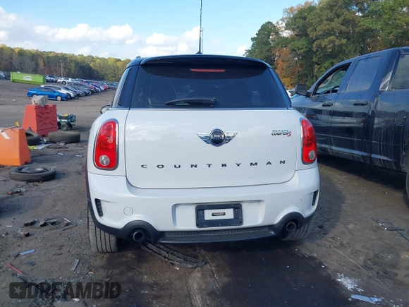 2015 MINI Countryman S with VIN WMWZC3C5XFWT06360, listed as a IAAI auction lot 40774863 with 127,383 mi miles and . Bid and sale history available at DreamBid. Image 16.