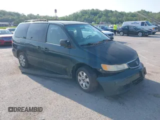 2000 Honda Odyssey LX z VIN 2HKRL1853YH598166, wystawiony jako IAAI lot #42142404 z przebiegiem 228 934 mil mil oraz . Historia ofert i sprzedaży dostępna na DreamBid. Obrazek 1.
