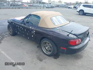 2004 Mazda MX-5 Miata LS with VIN JM1NB353040409951, listed as a IAAI auction lot 41848965 with 125,750 mi miles and . Bid and sale history available at DreamBid. Image 3.