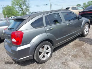 2011 Dodge Caliber Mainstreet with VIN 1B3CB3HA1BD247594, listed as a IAAI auction lot 42082305 with 122,438 mi miles. Bid and sale history available at carsss.com. Image 4.