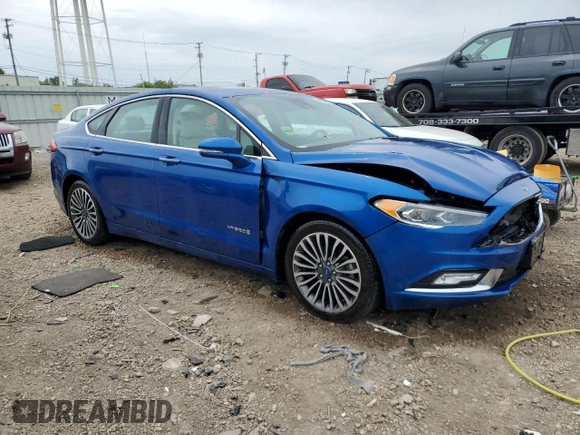 2017 Ford Fusion Hybrid Titanium with VIN 3FA6P0RU1HR138725, listed as a Copart auction lot 56650625 with 77,331 mi miles and Salvage title. Bid and sale history available at DreamBid. Image 4.