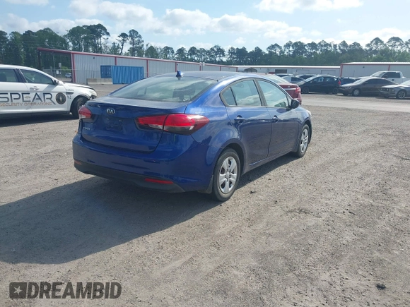 2018 Kia Forte LX with VIN 3KPFK4A71JE226693, listed as a IAAI auction lot 42094700 with 140,906 mi miles. Bid and sale history available at carsss.com. Image 4.
