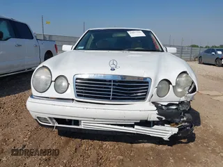 1999 Mercedes-Benz E-Class with VIN WDBJF65H6XA867166, listed as a IAAI auction lot 42017341 with 89,841 mi miles. Bid and sale history available at carsss.com. Image 12.