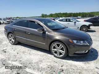 2013 Volkswagen CC Lux with VIN WVWRN7AN4DE546711, listed as a Copart auction lot 52673205 with 106,700 mi miles and Salvage Title. Bid and sale history available at DreamBid. Image 4.