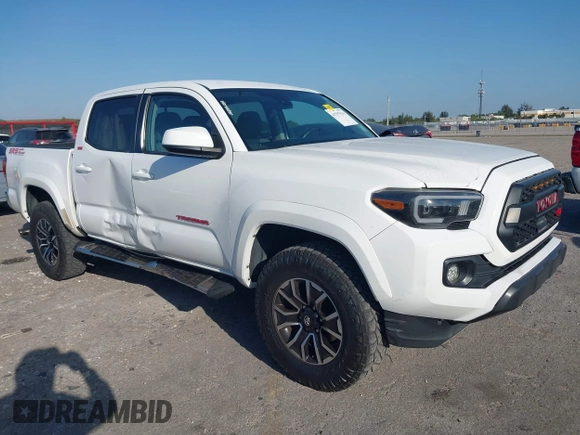 2018 Toyota Tacoma SR with VIN 5TFAX5GN2JX128621, listed as a IAAI auction lot 41797514 with 216,251 mi miles and . Bid and sale history available at DreamBid. Image 1.