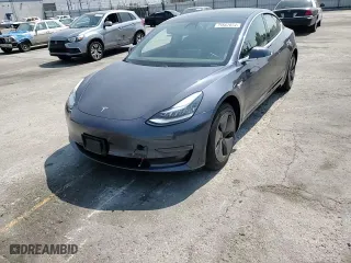 2020 Tesla Model 3 Standard Range Plus with VIN 5YJ3E1EA5LF644301, listed as a Copart auction lot 71667874 with 49,936 mi miles and Salvage Title. Bid and sale history available at carsss.com. Image 10.