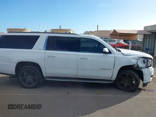 2015 GMC Yukon XL SLT with VIN 1GKS1HKC2FR612690, listed as a IAAI auction lot 41234188 with 113,830 mi miles. Bid and sale history available at carsss.com. Image 13.
