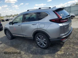 2020 Honda CR-V Touring z VIN 2HKRW2H95LH650860, wystawiony jako Copart lot #55510015 z przebiegiem 68 680 mil mil oraz Szkoda całkowita • Salvage title. Historia ofert i sprzedaży dostępna na DreamBid. Obrazek 2.