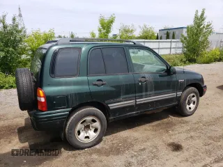 2003 Suzuki Vitara JLX z VIN 2S3TD52V136101732, wystawiony jako Copart lot #58477845 z przebiegiem 105 628 mil mil oraz Czysty tytuł • Clean title. Historia ofert i sprzedaży dostępna na DreamBid. Obrazek 3.