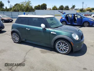 2009 MINI Hardtop S with VIN WMWMF73599TT96423, listed as a Copart auction lot 63913415 with 103,165 mi miles and Clean title. Bid and sale history available at DreamBid. Image 4.