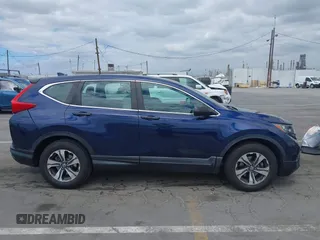 2019 Honda CR-V LX z VIN 2HKRW5H32KH415330, wystawiony jako IAAI lot #42055722 z przebiegiem 66 375 mil mil oraz . Historia ofert i sprzedaży dostępna na DreamBid. Obrazek 13.