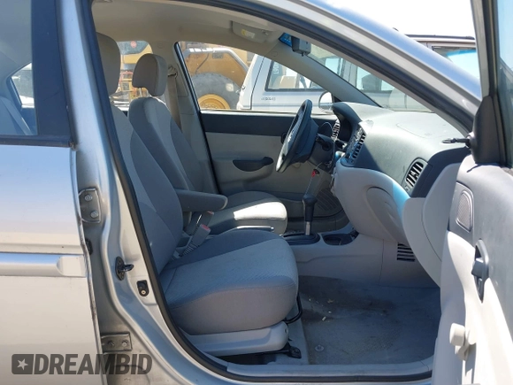2007 Hyundai Accent GLS with VIN KMHCN46C57U087156, listed as a IAAI auction lot 42151298 with 81,588 mi miles. Bid and sale history available at carsss.com. Image 5.