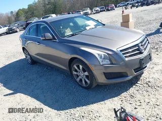 2014 Cadillac ATS Standard AWD with VIN 1G6AG5RX3E0164348, listed as a IAAI auction lot 41730257 with 126,534 mi miles and . Bid and sale history available at carsss.com. Image 1.