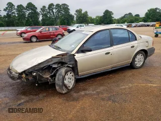 1997 Saturn SL with VIN 1G8ZF5284VZ404812, listed as a Copart auction lot 58836015 with 201,792 mi miles and Salvage title. Bid and sale history available at DreamBid. Image 1.