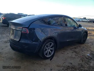 2023 Tesla Model Y Long Range with VIN 7SAYGDEE6PA081723, listed as a Copart auction lot 87232354 with 28,774 mi miles and Salvage Title. Bid and sale history available at carsss.com. Image 3.