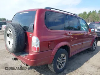 2004 Suzuki XL-7 LX with VIN JS3TX92V044105157, listed as a IAAI auction lot 42036497 with 244,104 mi miles. Bid and sale history available at carsss.com. Image 4.