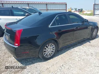 2013 Cadillac CTS Luxury with VIN 1G6DE5E55D0118722, listed as a IAAI auction lot 42448616 with 131,906 mi miles and . Bid and sale history available at DreamBid. Image 4.
