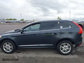 2015 Volvo XC60 T5 with VIN YV4612RKXF2710010, listed as a IAAI auction lot 41962055 with 163,050 mi miles. Bid and sale history available at carsss.com. Image 14.