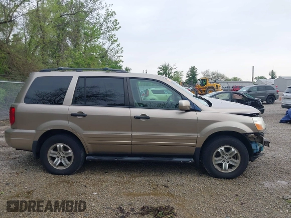 2005 Honda Pilot EX-L z VIN 2HKYF187X5H548431, wystawiony jako IAAI lot #42202692 z przebiegiem 199 889 mil mil oraz . Historia ofert i sprzedaży dostępna na DreamBid. Obrazek 14.